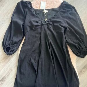 Black puff sleeve mini dress with bust detail